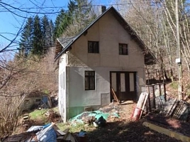 Spoluvlastnický podíl&nbsp;11/24 na&nbsp;pozemku, rodinném domě a&nbsp;jiné stavbě
